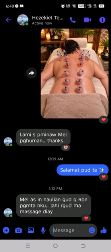 Client sharing positive feedback after hot stone massage